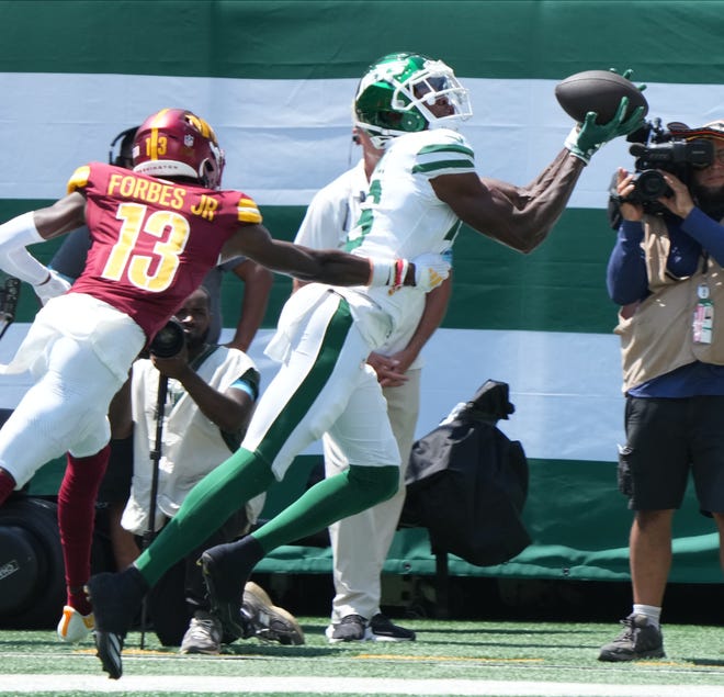 East Rutherford, NJ -- August 10, 2024 -- Jason Brownlee of the Jets makes this TD catch in the first half as the Washington Commanders came to MetLife Stadium to play the New York Jets in the first press season game of the 2024 season.