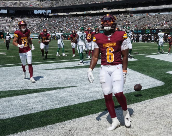 East Rutherford, NJ -- August 10, 2024 -- Michael Wiley scores a Commander TD in the second half as the Washington Commanders came to MetLife Stadium to play the New York Jets in the first press season game of the 2024 season. The Jets topped the Commanders 20-17.