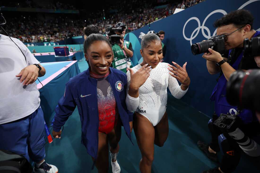 Silver medalist Simone Biles (L) and bronze medalist Jordan Chiles (R) of Team United States celebrate after competing in the floor exercise final last week. Chiles had just learned she was moved from fifth to third following a scoring inquiry. An independent court arbitrator has determined that inquiry was made four seconds to late.