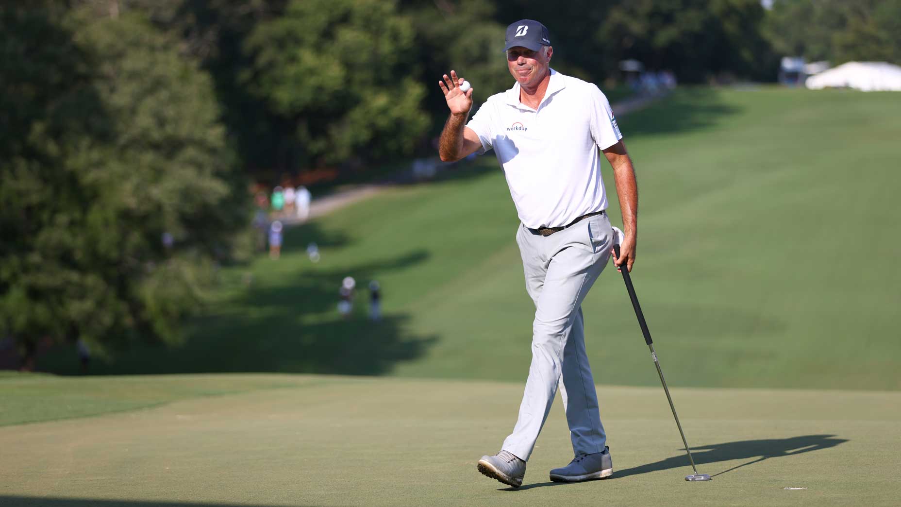 Matt Kuchar reacts to a birdie putt at the Wyndham.