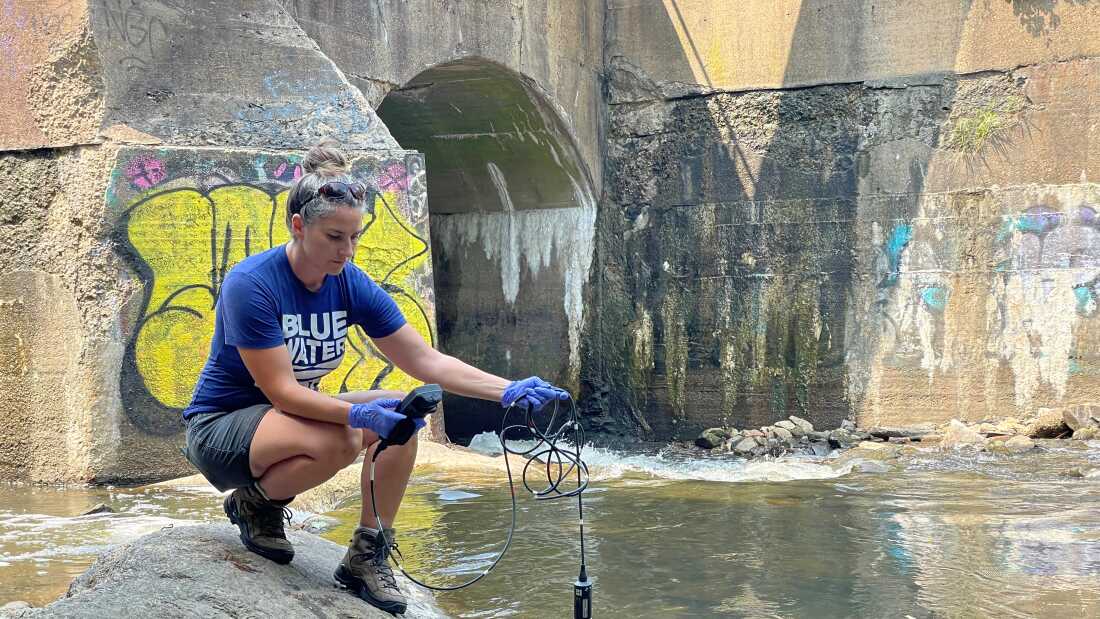 Baltimore Harbor Waterkeeper Alice Volpitta tests water quality in the Jones Falls.