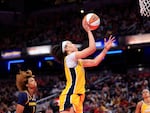 Dearica Hamby of the Los Angeles Sparks attempts a shot during a May 2024 game in Indianapolis, Indiana. 