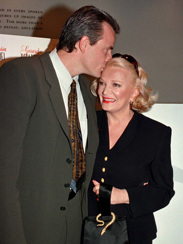 Actress Gena Rowlands gets a kiss on the forehead from her son, director Nick Cassavetes, at a recep..