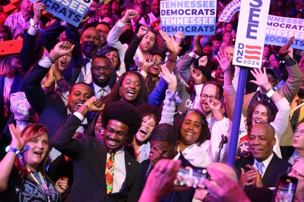 Tennessee delegates cast their votes in the ceremonial roll call,...