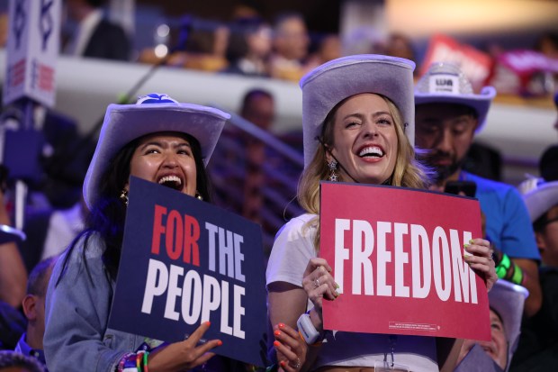 Washington delegates listen to Sen. Tammy Duckworth on Aug. 20,...