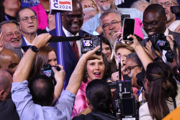 Gov. Gretchen Whitmer of Michigan is swarmed by media on...