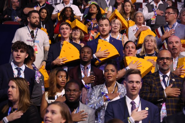 Wisconsin delegates recite the Pledge of Allegiance, Aug. 20, 2024,...