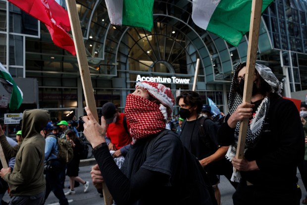 Activists rally outside the Israeli Consulate while protesting the war...