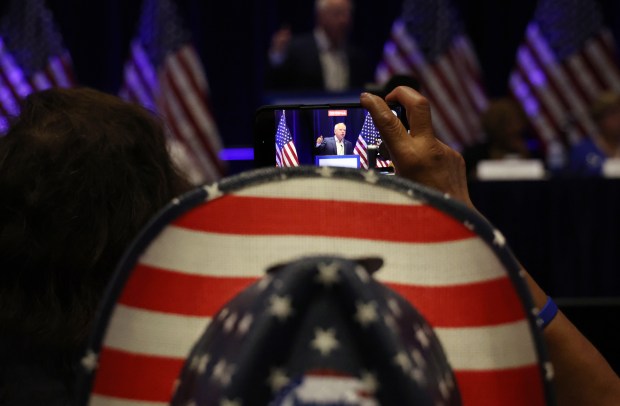 A delegate records Democratic vice presidential nominee Minnesota Gov. Tim...