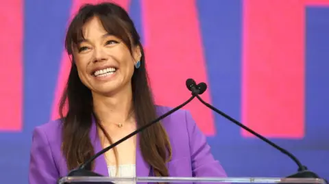 Getty Images Nicole Shanahan speaks during a campaign event in Oakland, California, on 26 March 2024 