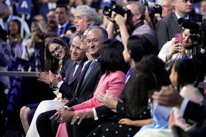 Second Gentleman Doug Emhoff, Ella Emhoff, Cole Emhoff and other family members watch as Democratic Presidential nominee Vice President Kamala Harris delivers her acceptance speech during the final day of the Democratic National Convention at the United Center.