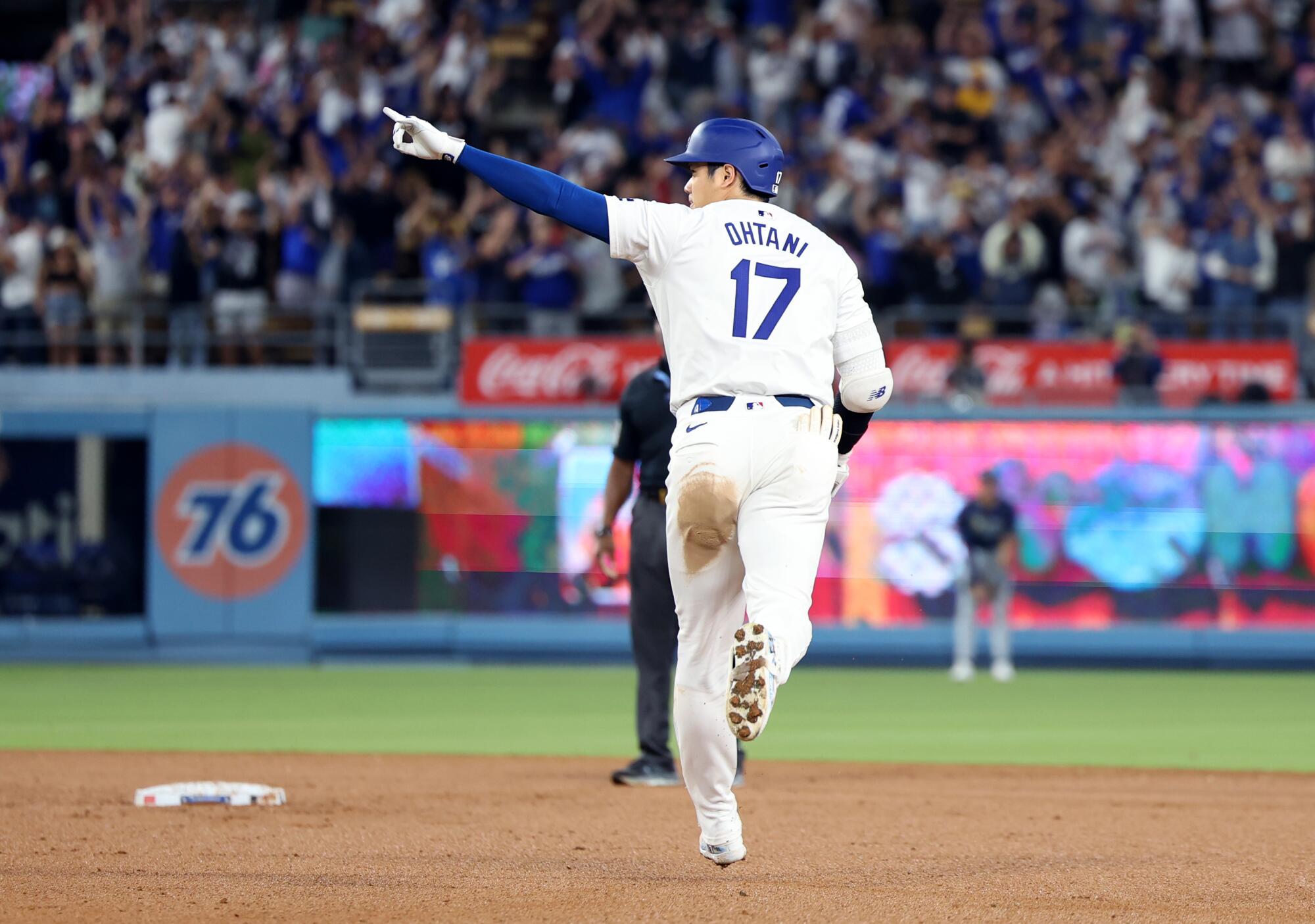 Shohei Ohtani runs the bases after hitting a walk-off grand slam in the Dodgers' 7-3 win over the Rays.