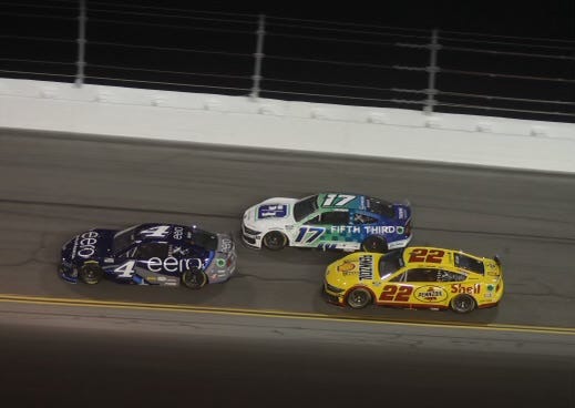 Josh Berry leads Chris Buescher and Joey Logano during Stage 1 of the Coke Zero Sugar 400, Saturday, Aug. 24, 2024, at Daytona International Speedway.