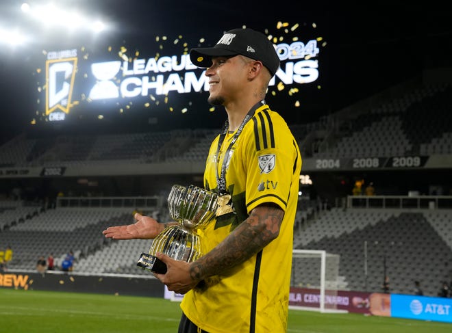 Aug 25, 2024; Columbus, Ohio, USA; 
Columbus Crew forward Cucho Hernández (9) holds the Best Player trophy after a 3-1 win over Los Angeles FC in the Leagues Cup Final at Lower.com Field. 
Mandatory Credit: Barbara Perenic-USA TODAY Sports