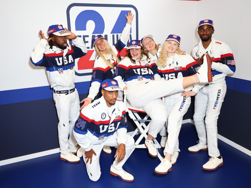 U.S. Paralympians Isaac Jean-Paul, Erin Kerkhoff, Jaydin Blackwell, Noelle Malkamaki, Jessica Heims, Liza Corso and Jonathan Gore pose in Paris on Saturday.