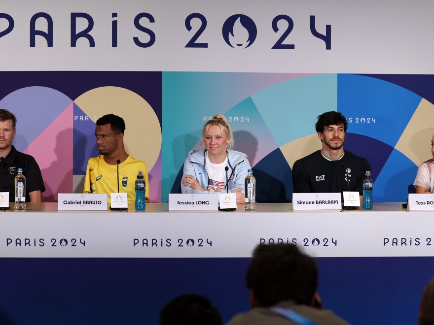 From left, swimmers Cameron Leslie of New Zealand, Gabriel Araujo of Brazil, Jessica Long of the U.S., Simone Barlaam of Italy and Tess Routliffe of Canada speak at a press conference in Paris on Tuesday.