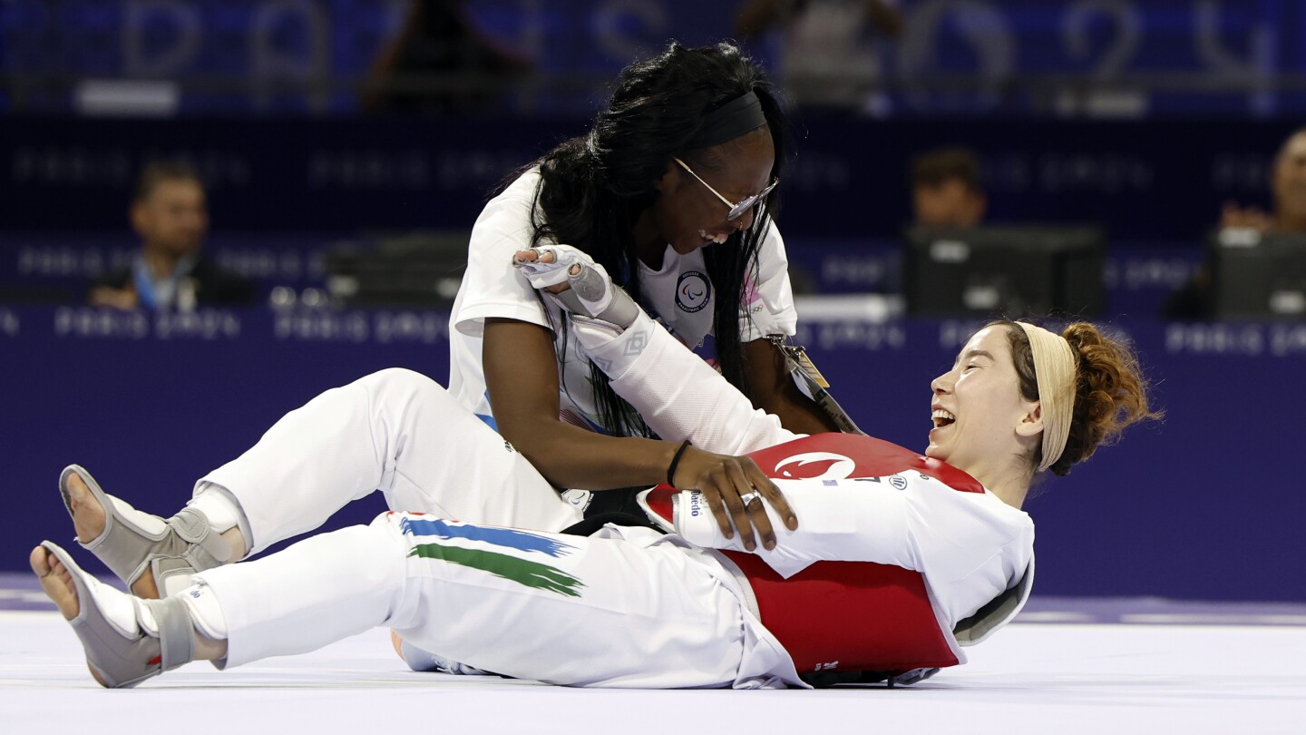 Afghan taekwondo para-athlete makes history with the first medal for the Refugee Paralympic Team