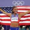 Sprinter Gabby Thomas of the U.S. celebrates winning the gold medal after competing in the women's 200m final on Tuesday at the Paris Olympic Games at Stade de France.