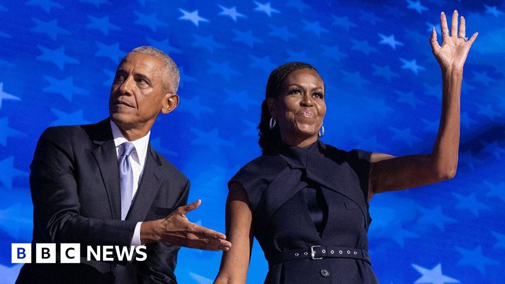 Barack and Michelle Obama electrify Democrats but warn of tight race