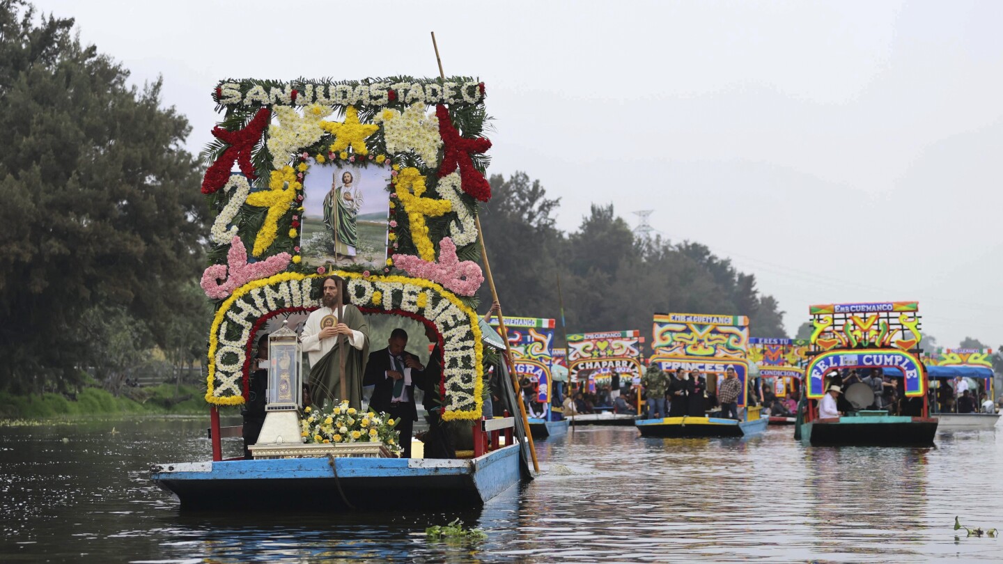 Catholic devotees honor St Jude's relic with watery procession through Mexico's Xochimilco canals