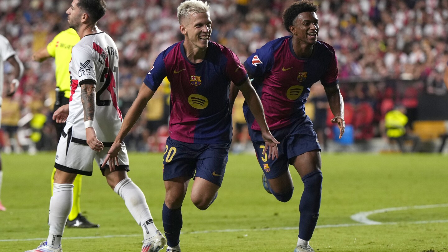 Dani Olmo scores in his debut to keep Barcelona perfect after 2-1 win over Rayo in Spanish league