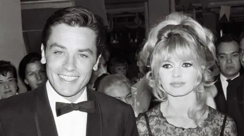 Alamy Brigitte Bardot and Alain Delon