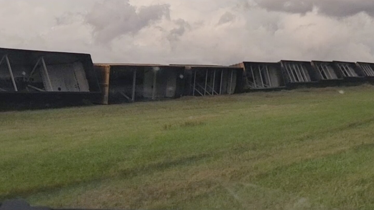 High winds, possibly from a tornado, derail 43 train cars in North Dakota