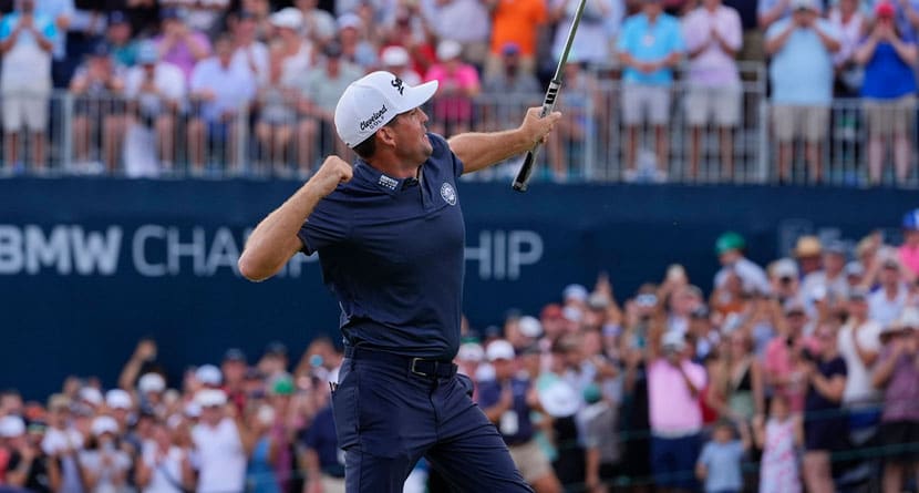 Keegan Bradley celebrates on the 18th green after winning the BMW Championship golf event at Castle Pines Golf Club, Sunday, Aug. 25, 2024, in Castle Rock, Colo. (AP Photo/Matt York)