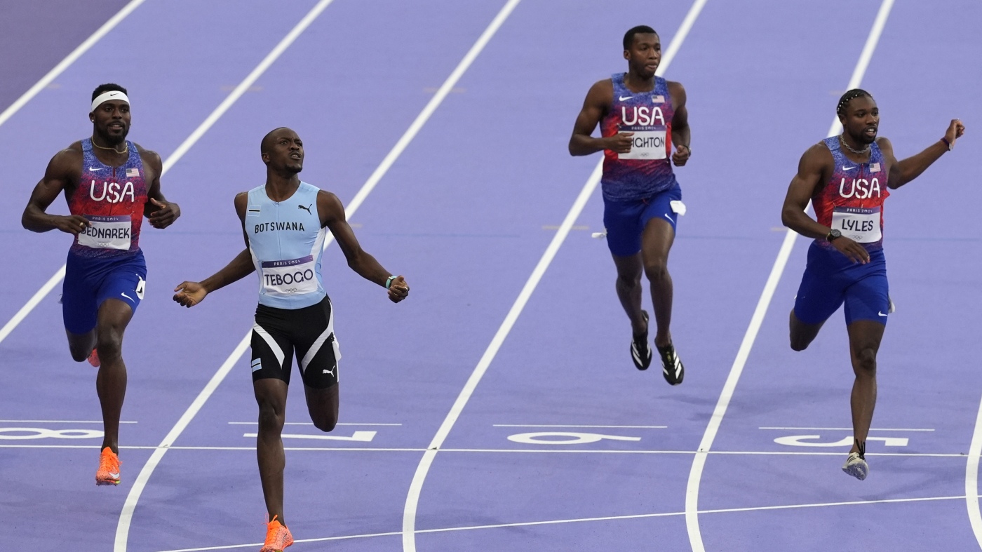 Noah Lyles reveals COVID diagnosis after finishing 200m with bronze : NPR