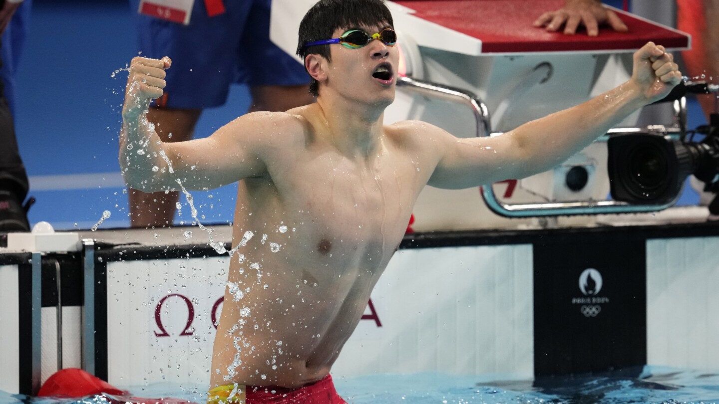 Pan Zhanle of China breaks own world record to win Olympic gold medal in men's 100-meter freestyle