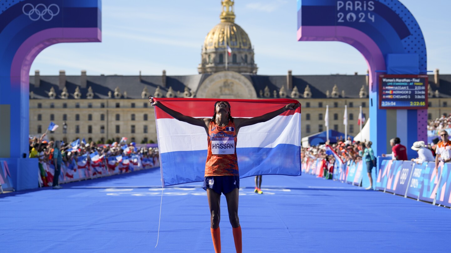 Sifan Hassan wins women's marathon at Paris Olympics after trading elbows with Tigst Assefa