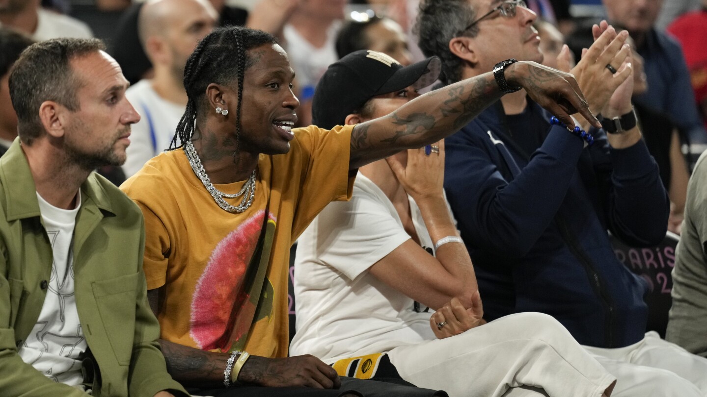 Travis Scott remains in custody after altercation with security guard