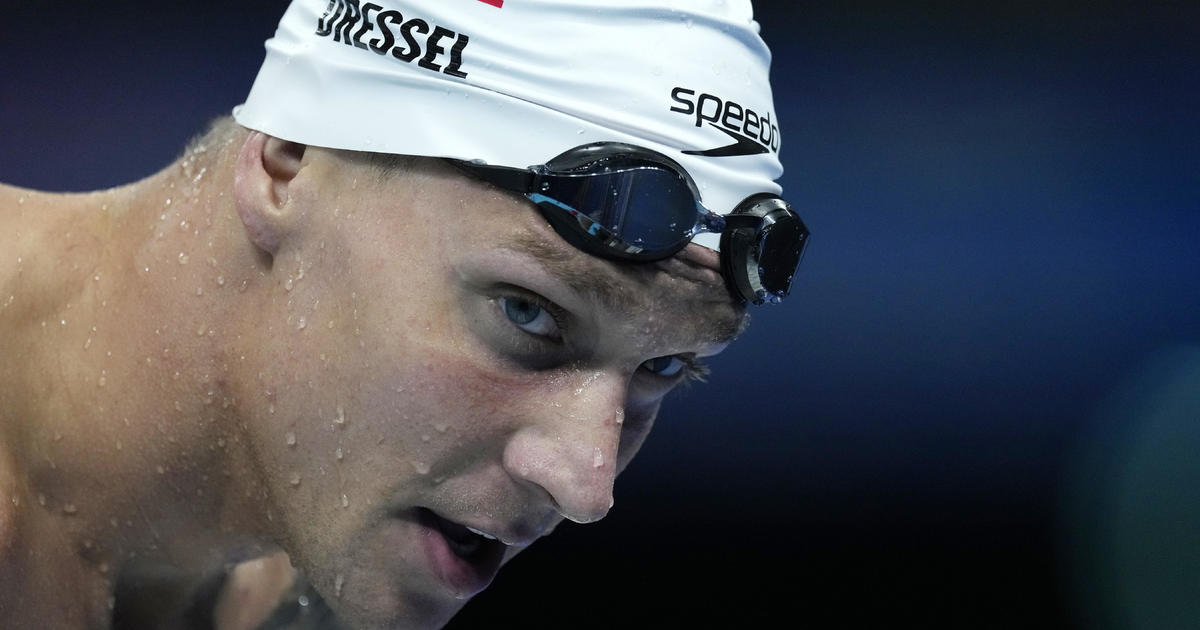 U.S. swimmer Caeleb Dressel breaks down in tears after failing to defend his gold in solo events