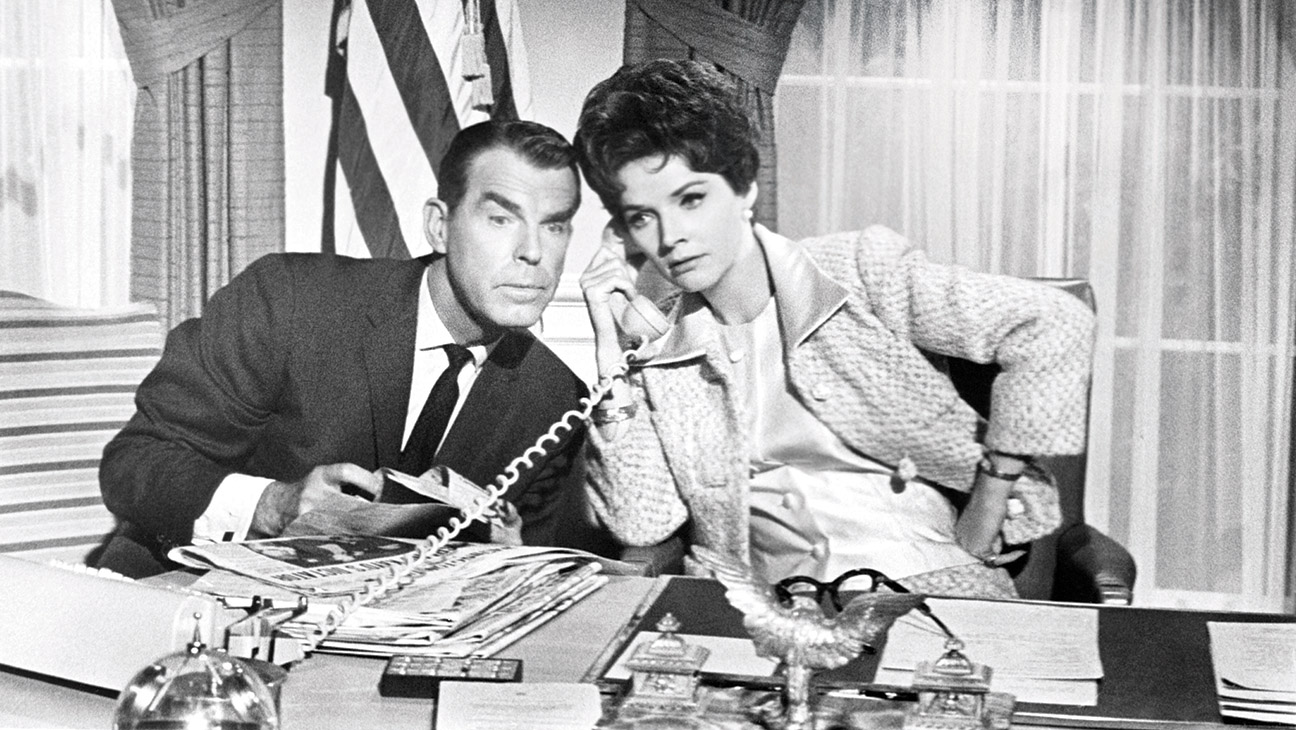 Polly Bergen and Fred MacMurray in Kisses for My President, concerned with what may be termed a fantastic premise election of a woman president, wrote THR in its review.