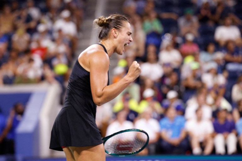 Belarus's Aryna Sabalenka celebrates a point during her women's singles round of 16 tennis match against Belgium's Elise Mertens on day seven of the US Open tennis tournament at the USTA Billie Jean King National Tennis Center in New York City, on September 1, 2024. (Photo by Kena Betancur / AFP)