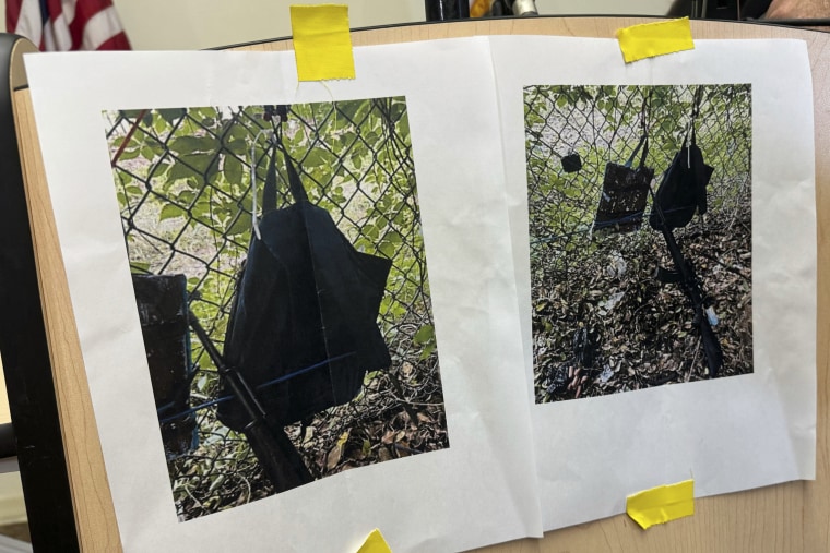 Photos show a weapon, a backpack and a GoPro camera on a fence outside Trump International Golf Club in West Palm Beach, Fla., taken after an apparent attempt to assassinate former President Donald Trump on Sunday. 