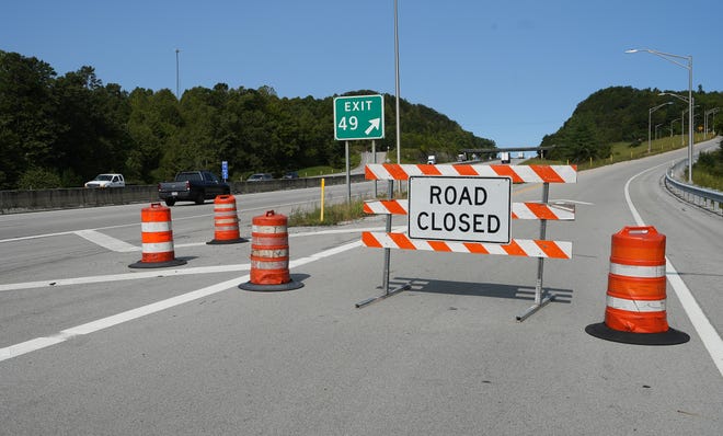 Federal, state and local law enforcement continue a manhunt for suspected highway shooter, Joseph Couch, in the wooded area along I-75 about 8 miles north of London, Ky. on Sep. 9, 2024. This view is looking north of exit 49.