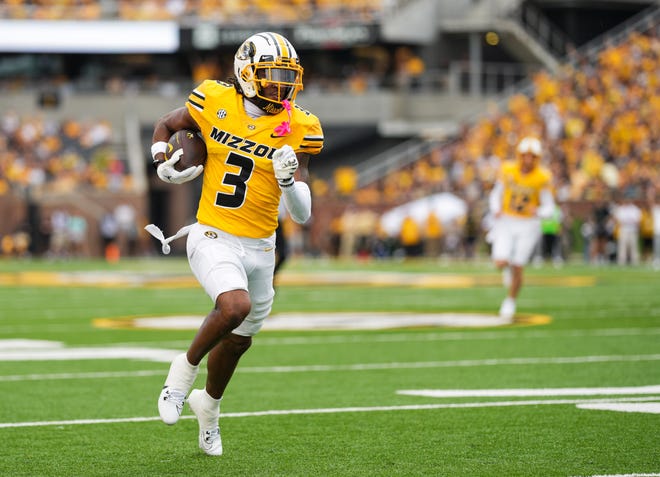 Sep 21, 2024; Columbia, Missouri, USA; Missouri Tigers wide receiver Luther Burden III (3) scores a touchdown during the first half against the Vanderbilt Commodores at Faurot Field at Memorial Stadium. Mandatory Credit: Jay Biggerstaff-Imagn Images