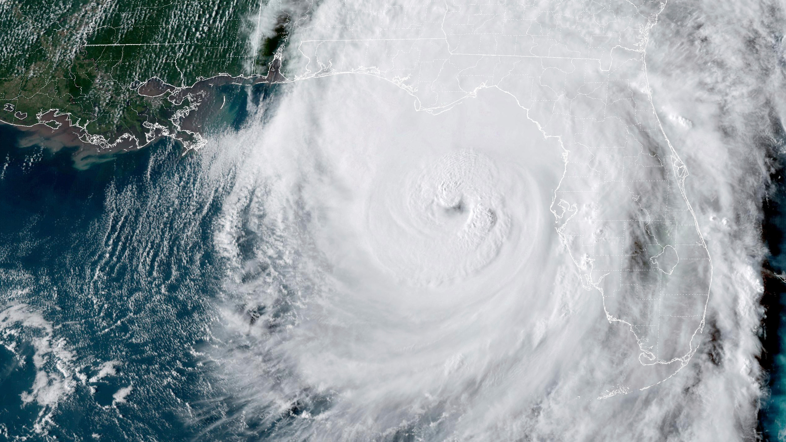 This GOES-16 GeoColor satellite image taken at 5:46 p.m. EDT and provided by National Oceanic and Atmospheric Administration (NOAA) shows Hurricane Helene in the Gulf of Mexico moving towards Florida, Thursday, Sept. 26 2024.