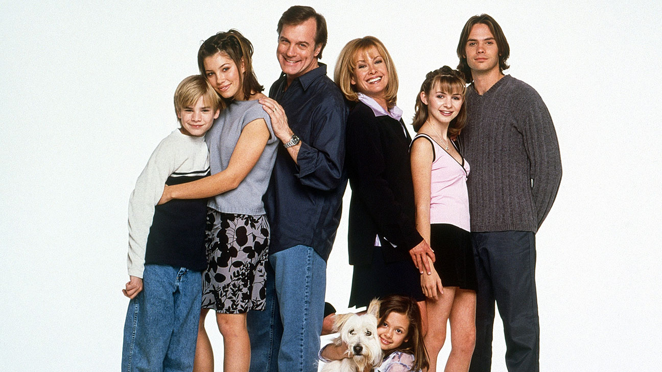 From left: David Gallagher, Jessica Biel, Stephen Collins, Mackenzie Rosman (with Happy the dog), Catherine Hicks, Beverley Mitchell, Barry Watson.