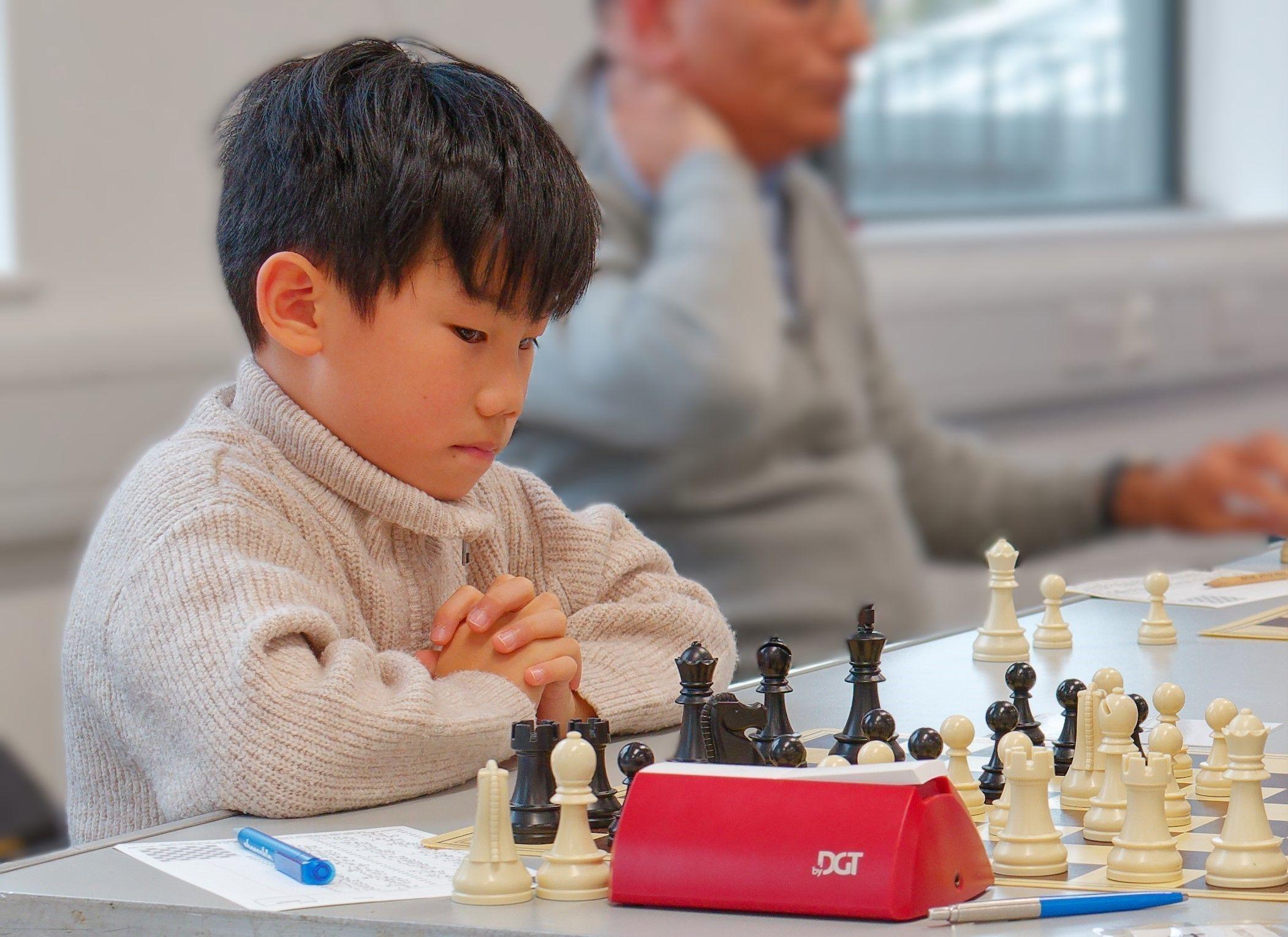 9-Year-Old Ethan Pang Defeats Three Grandmasters In One Event