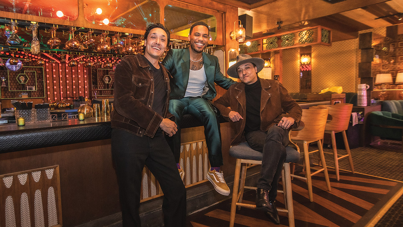 Anderson .Paak flanked by Mark Houston (left) and Jonnie Houston, founding partners of Andy’s, serving sick beats and craft cocktails.