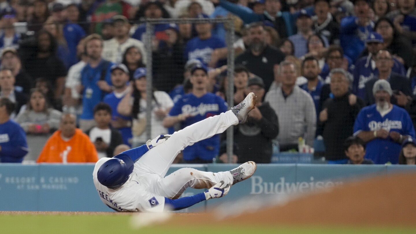 Dodgers leave Freddie Freeman in Los Angeles to rest a sore right ankle ahead of the playoffs