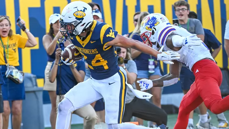 Greene Rallies West Virginia to a 32-28 Win Over Kansas