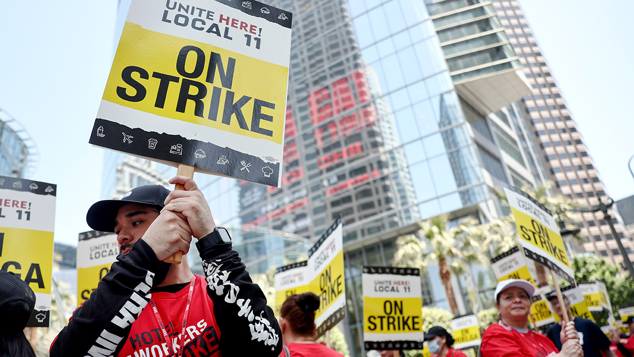 Hotel workers with Unite Here Local 11 picket outside the InterContinental hotel on the first day of a strike by union members at many major hotels in Southern California on July 2, 2023 in Los Angeles, California. The union represents nearly 15,000 workers from 65 major hotels in Los Angeles and Orange Counties who are calling for higher pay and increased benefits. Affected hotels are currently remaining open with management and nonunion staff attempting to fill in during the strike ahead of the 4th of July holiday.