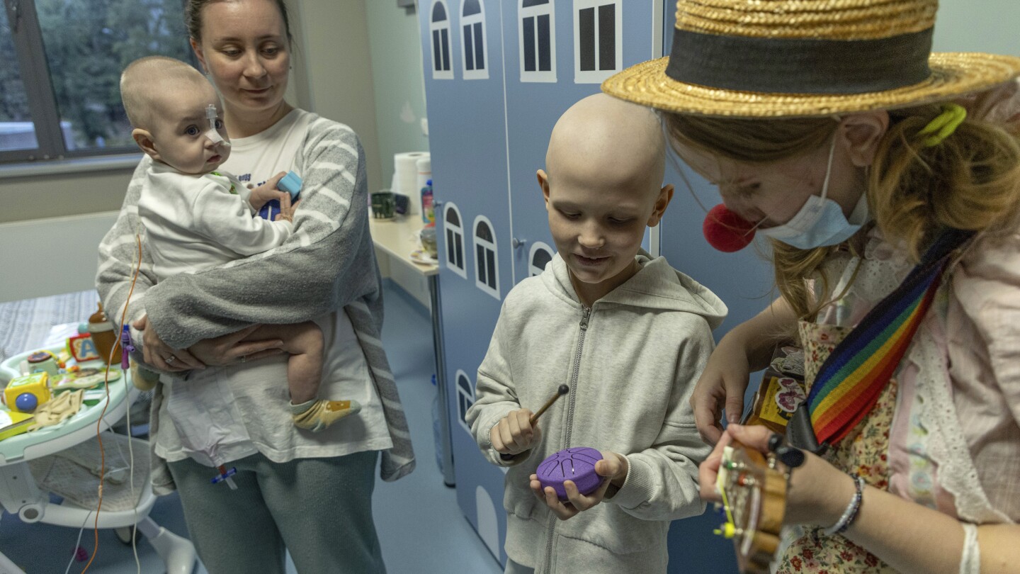 Hospital clowns bring joy to young Ukrainian cancer patients who survived Russian missile attack