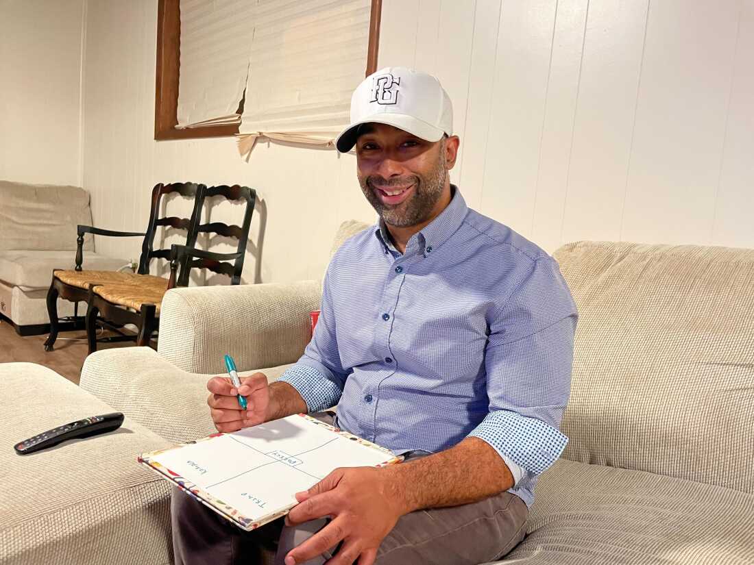 Cameron Lewellen takes notes in permanent marker during the first presidential debate between Vice President Kamala Harris and former President Donald Trump. He paid attention to how many times the candidates addressed policy versus personal attacks.