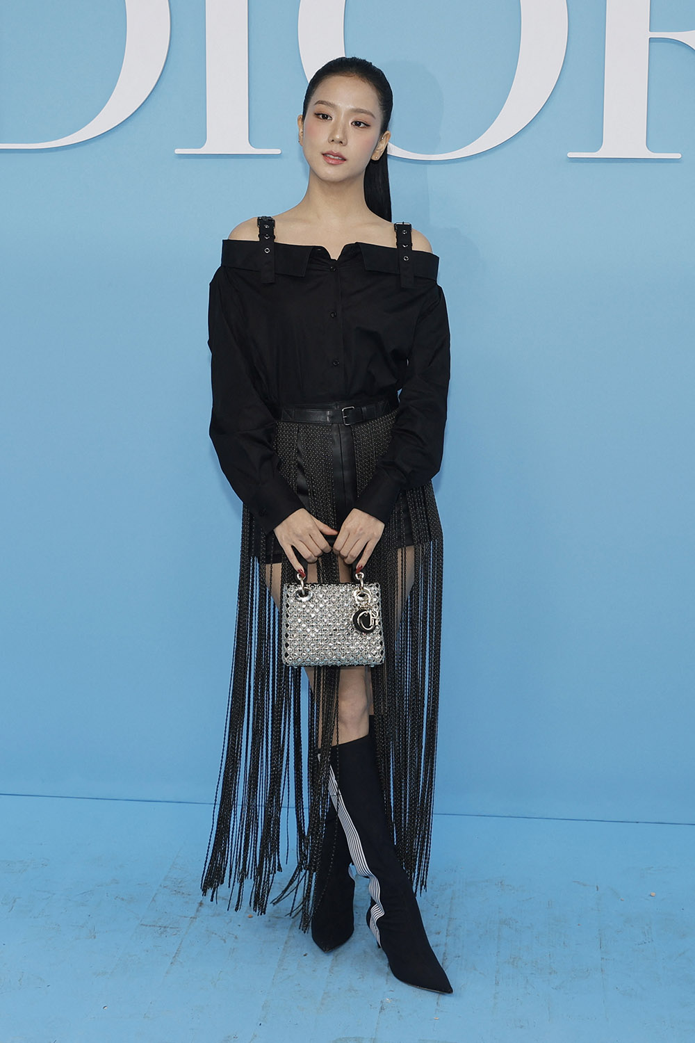 South Korean singer and actress Kim Jisoo poses upon arrival ahead of Dior Women Ready-to-wear Spring-Summer 2025 show as part of the Paris Fashion Week, in Paris on September 24, 2024.