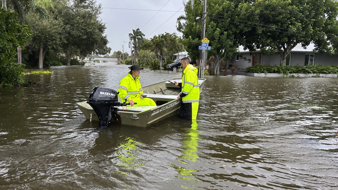 Rescuers save and assist hundreds as Helene's storm surge and rain create havoc