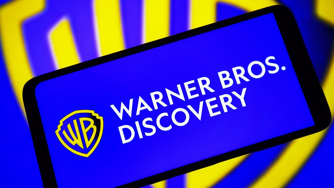 Warner Bros. Discovery, Inc. logo is seen on a smartphone screen.